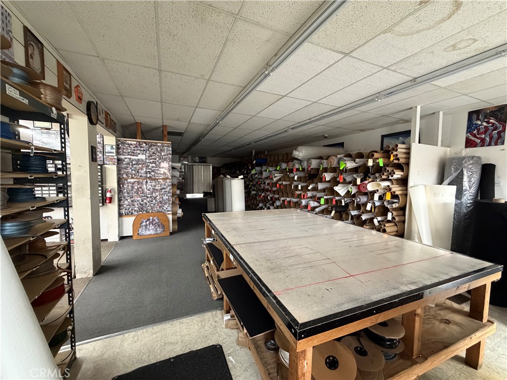 247 South Riverside Avenue Rialto, CA 92376 - Photo 7 of 34 a view of a room with gym equipment