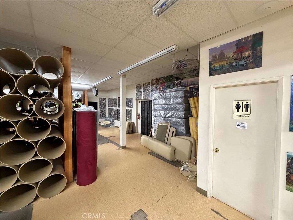 247 South Riverside Avenue Rialto, CA 92376 - Photo 8 of 34 a view of living room with furniture and wooden floor