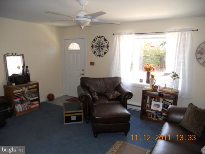 4101 Roop Road Mount Airy, MD 21771 - Photo 19 of 28 a living room with furniture and a large window