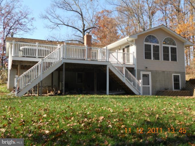 4101 Roop Road Mount Airy, MD 21771 - Photo 23 of 28 a view of house with yard and green space