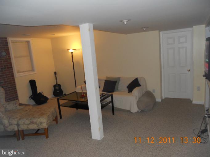 4101 Roop Road Mount Airy, MD 21771 - Photo 26 of 28 a living room with furniture and a couch