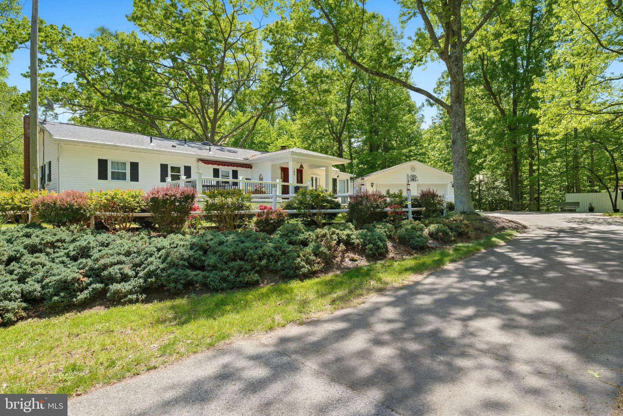 100 David Gray Road St. Leonard, MD 20685 - Photo 2 of 61 Mature trees welcoming your and your guests.
