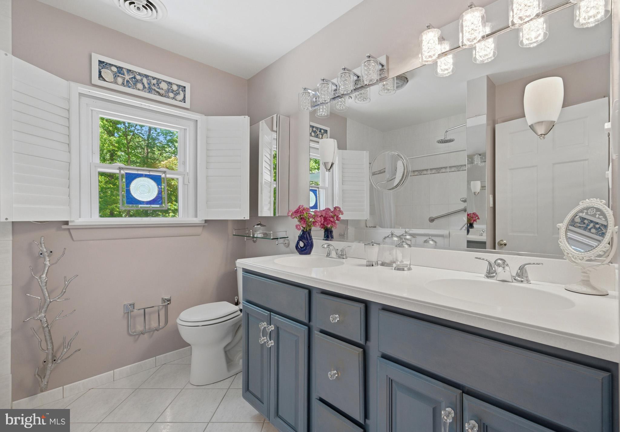 100 David Gray Road St. Leonard, MD 20685 - Photo 29 of 61 Main floor full bath with large double vanity.