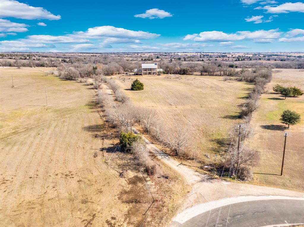 10400 Baucum Road Midlothian, TX 76065 - Photo 5 of 17 a view of an ocean beach