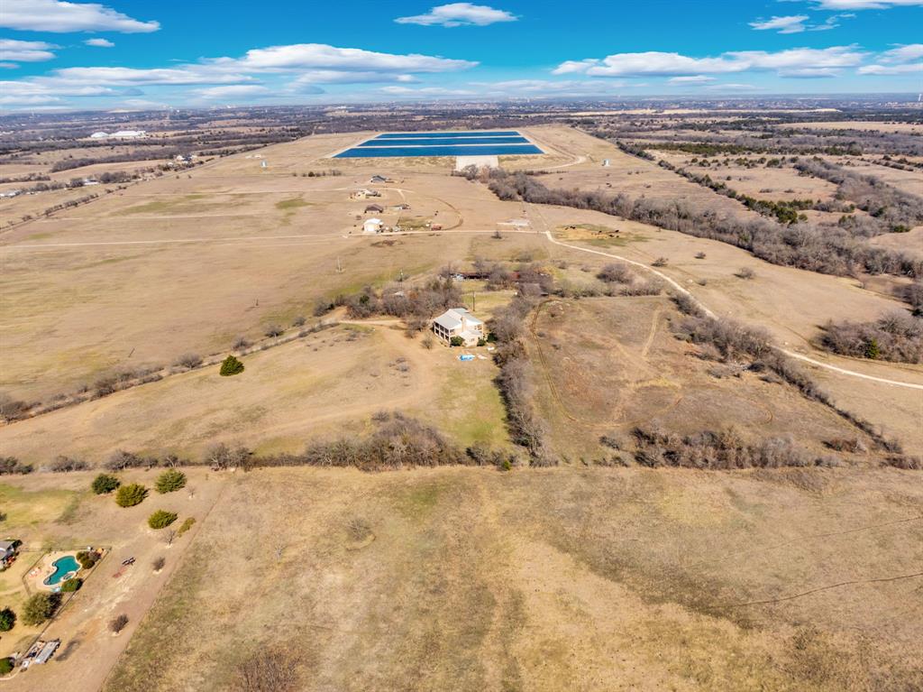 10400 Baucum Road Midlothian, TX 76065 - Photo 9 of 17 a view of beach and ocean