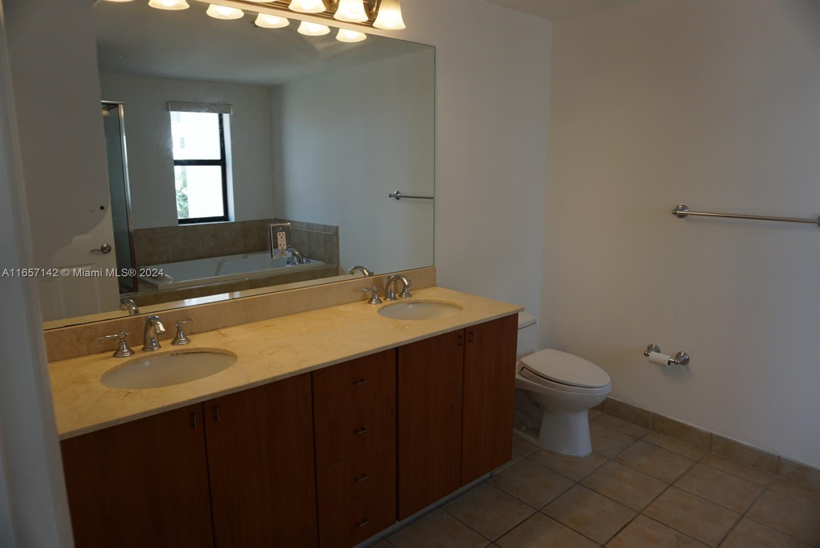 888 Douglas Road, Unit 1017 Coral Gables, FL 33134 - Photo 12 of 20 master bathroom