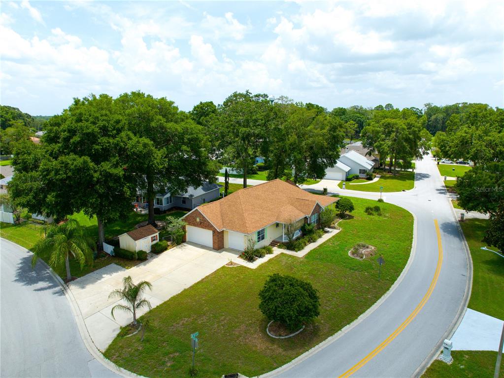 a view of a swimming pool with a yard