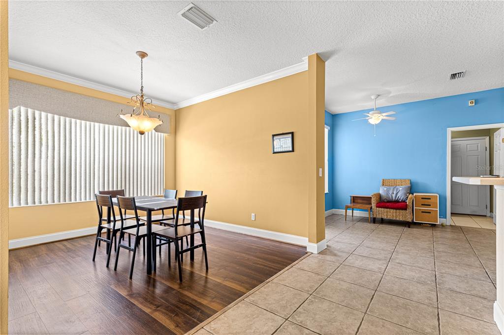 6551 Southeast 11th Loop Ocala, FL 34472 - Photo 11 of 46 a view of a livingroom with furniture and a dining room