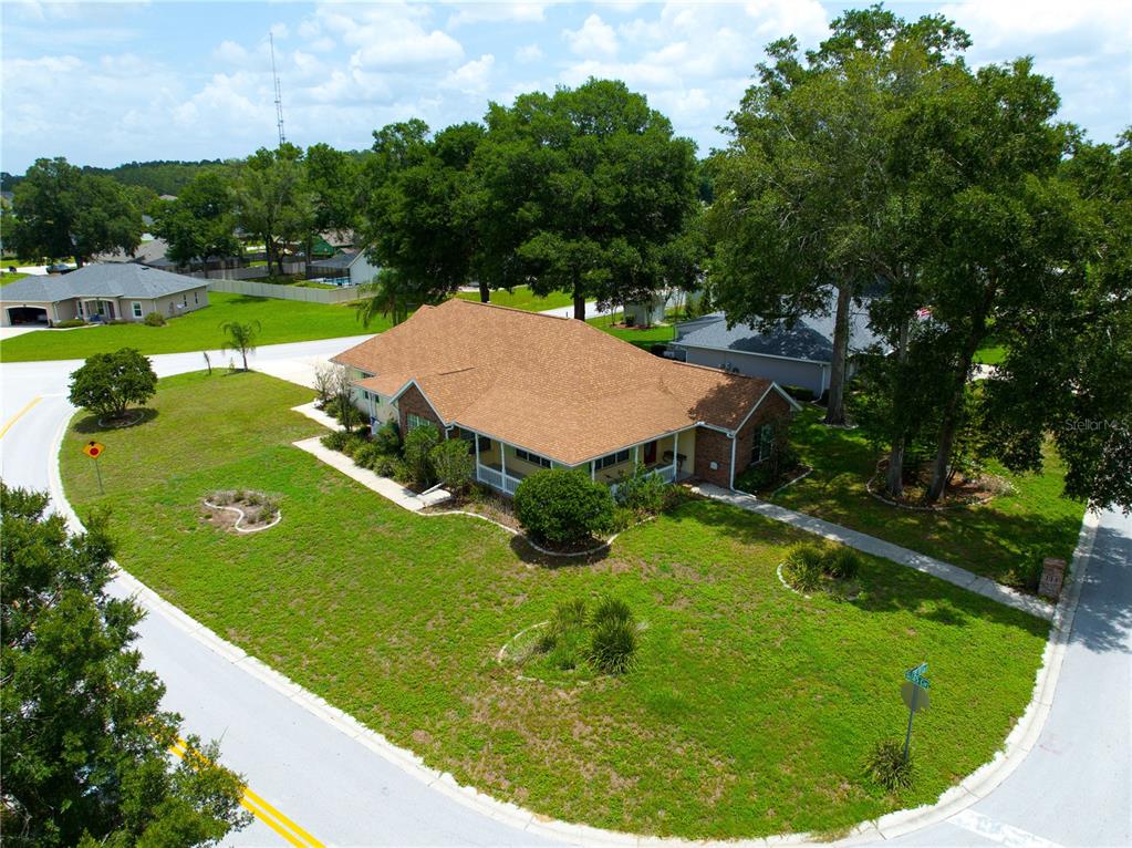 6551 Southeast 11th Loop Ocala, FL 34472 - Photo 45 of 46 a view of a table and chairs in backyard