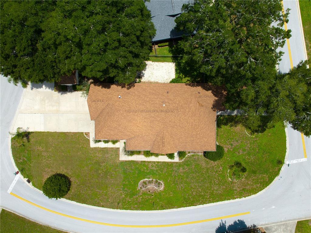 6551 Southeast 11th Loop Ocala, FL 34472 - Photo 46 of 46 an aerial view of a residential houses with yard