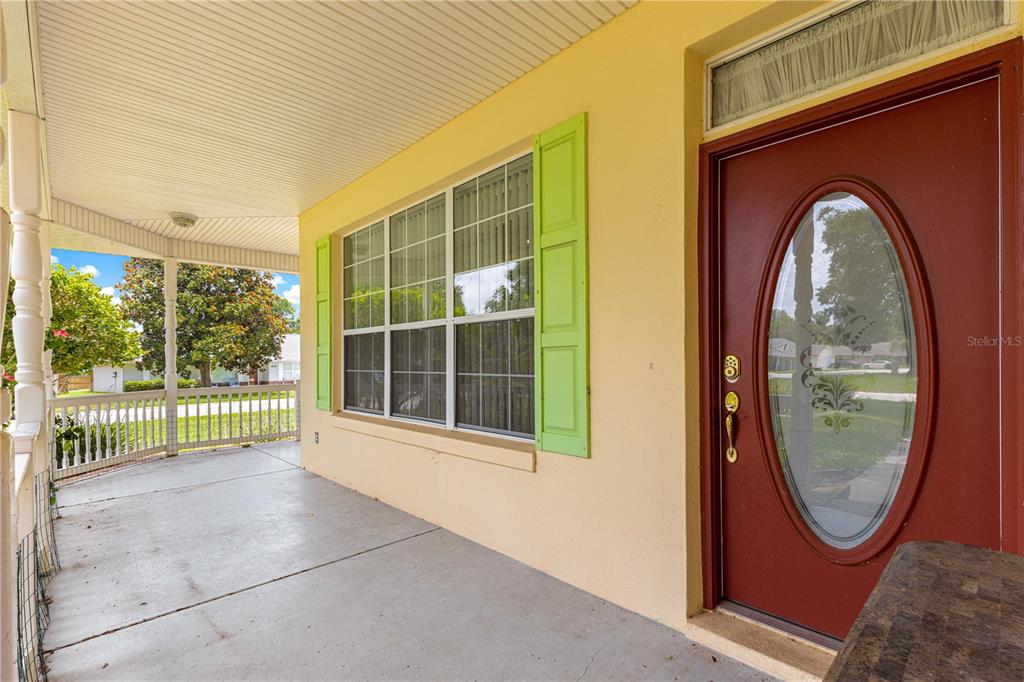 6551 Southeast 11th Loop Ocala, FL 34472 - Photo 5 of 46 a view of a house with a large window
