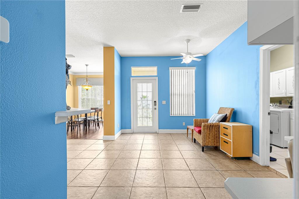 6551 Southeast 11th Loop Ocala, FL 34472 - Photo 6 of 46 a living room with furniture and large windows