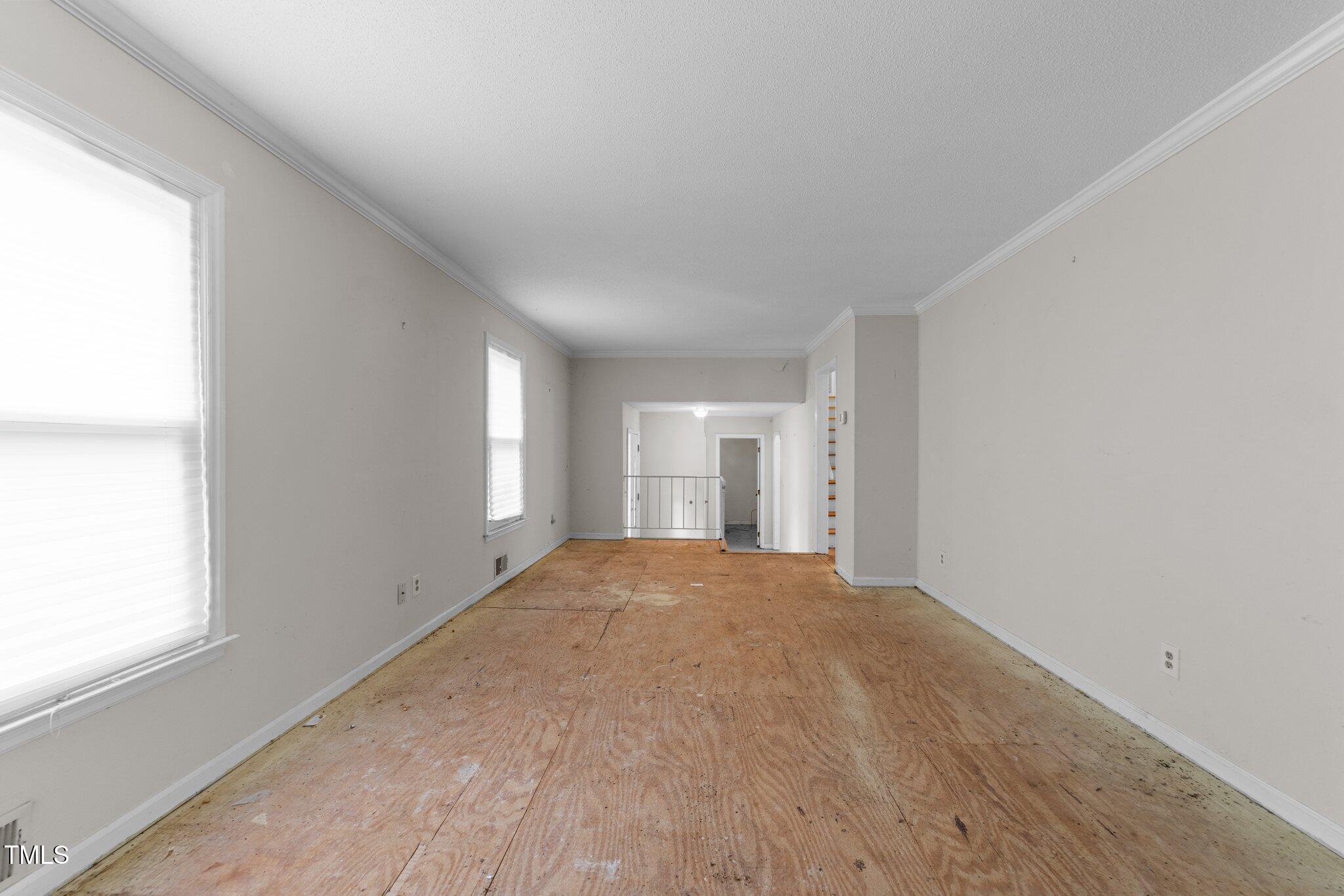 204 Chatterson Drive Raleigh, NC 27615 - Photo 8 of 40 a view of empty room with window
