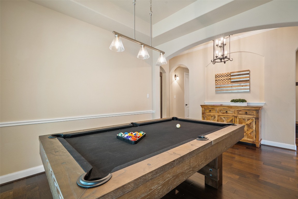 209 Maxwell Way Austin, TX 78738 - Photo 10 of 32 a view of a dining room with furniture and wooden floor