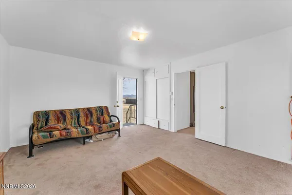 a living room with a couch and a couch