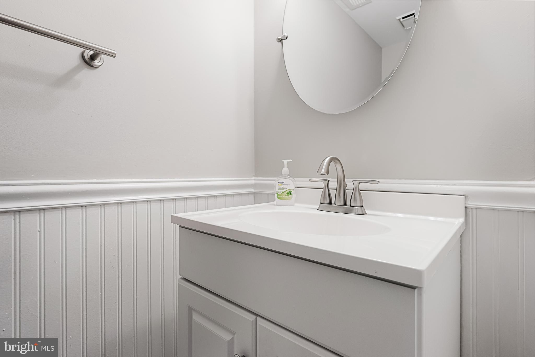 150 Baker Avenue Atco, NJ 08004 - Photo 17 of 32 a bathroom with a sink and a mirror