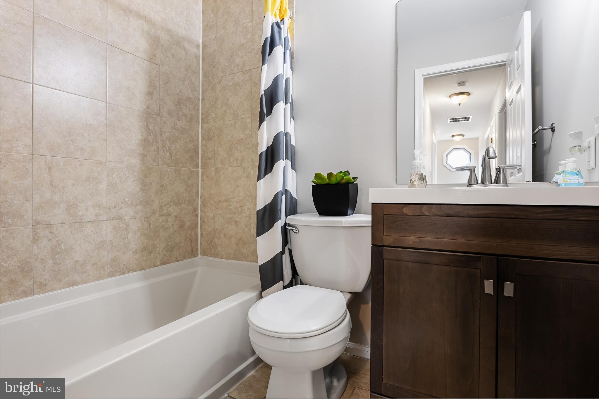 150 Baker Avenue Atco, NJ 08004 - Photo 26 of 32 a bathroom with a sink a toilet and shower