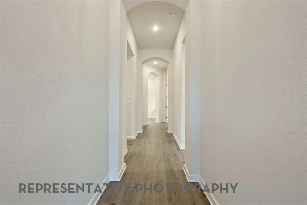 2620 Brooklyn Street Forney, TX 75126 - Photo 15 of 19 a view of a hallway with wooden floor