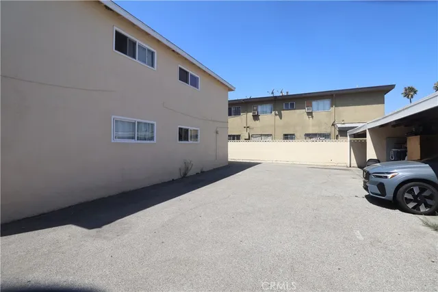 a picture of a couch in front of a house
