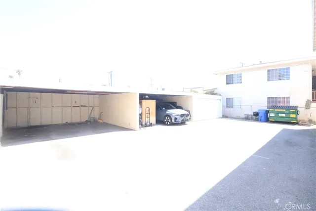 a view of a kitchen with a sink and a microwave