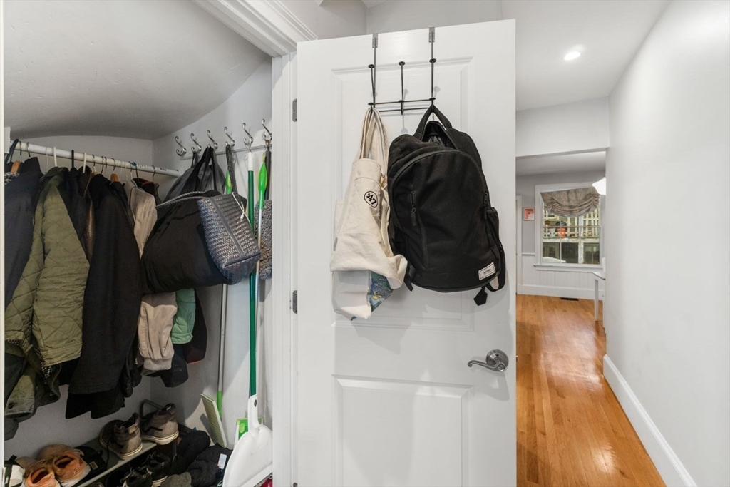 51-53 Story Street, Unit 1 Boston, MA 02127 - Photo 13 of 33 a view of walk in closet with clothes and shoes