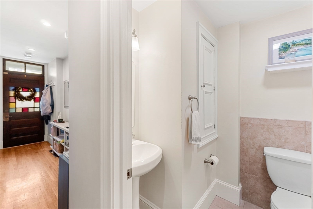 51-53 Story Street, Unit 1 Boston, MA 02127 - Photo 17 of 33 a bathroom with a toilet and a shower