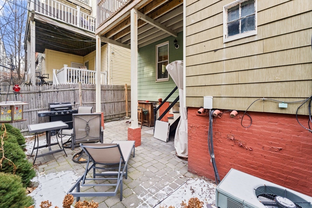 51-53 Story Street, Unit 1 Boston, MA 02127 - Photo 30 of 33 a view of a lounge chairs in the patio