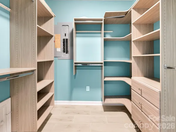 a kitchen with a cabinets and a fireplace