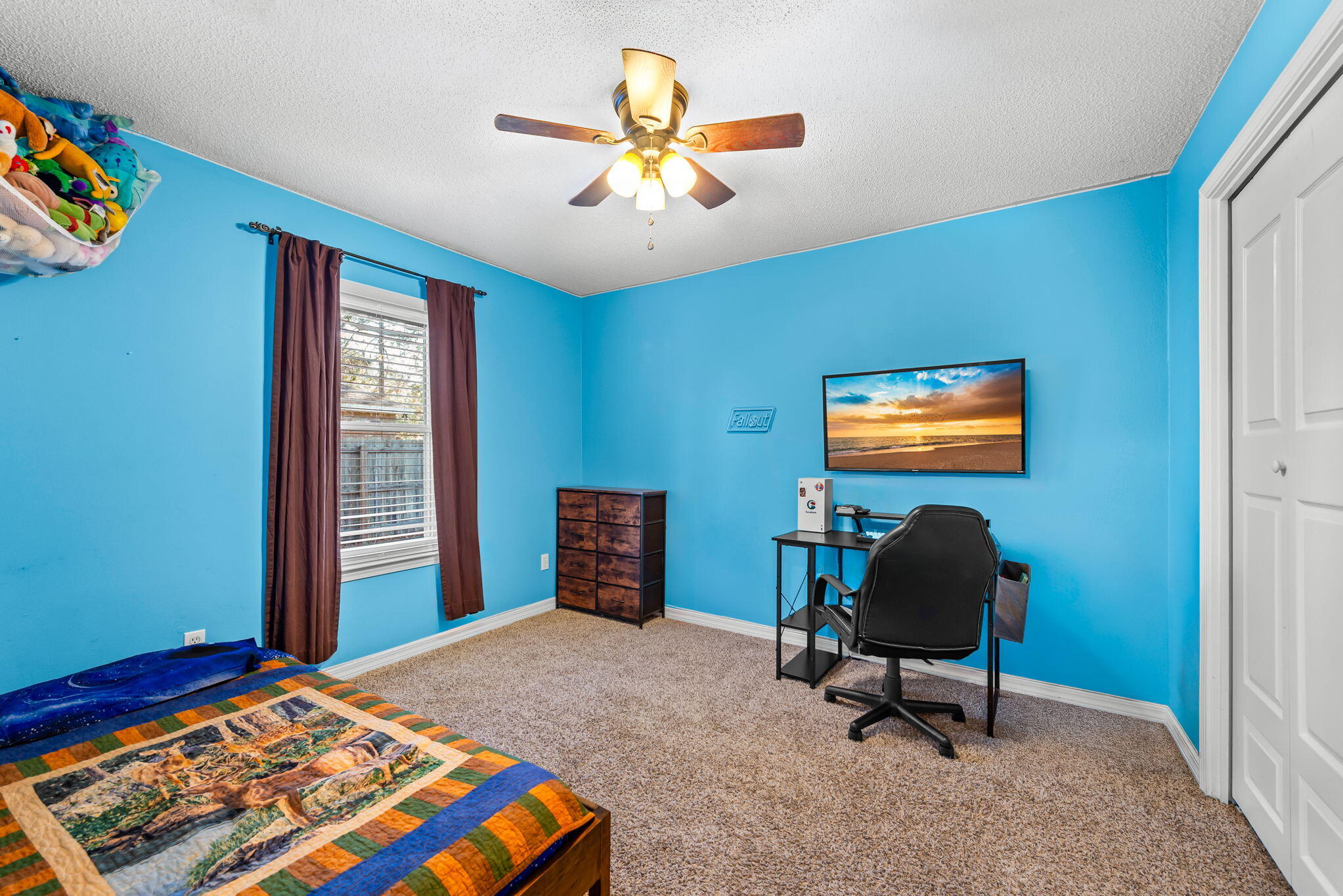 7373 Rexford Street Navarre, FL 32566 - Photo 40 of 56 a workspace with furniture and window