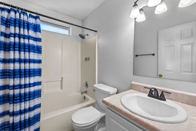 a view of a house with a tub and plants