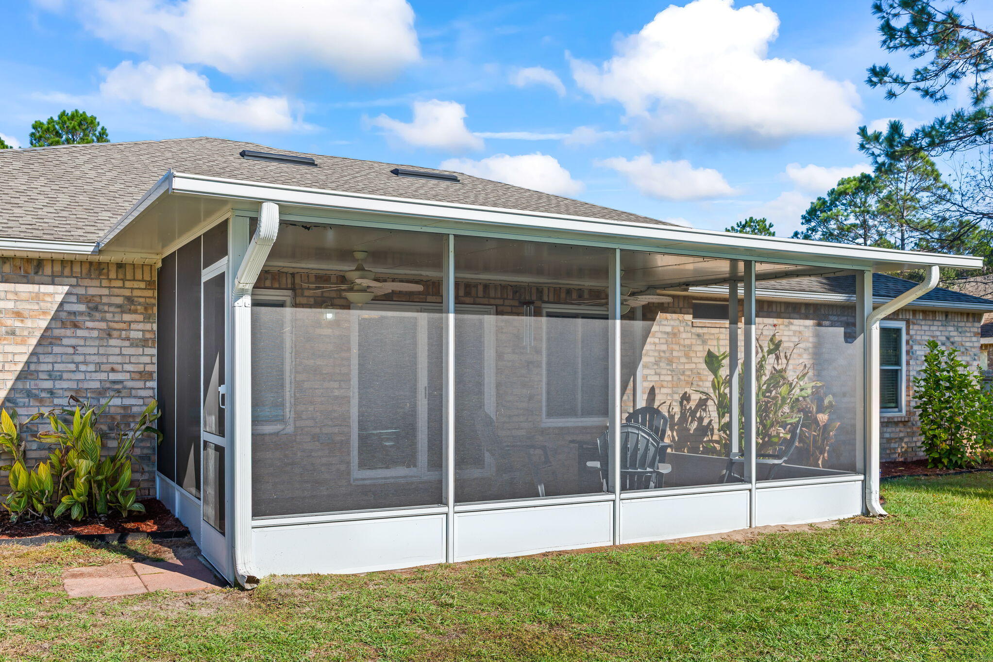 7373 Rexford Street Navarre, FL 32566 - Photo 49 of 56 a view of a garden