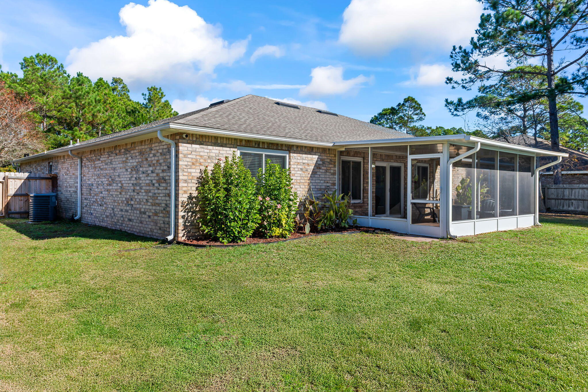 7373 Rexford Street Navarre, FL 32566 - Photo 54 of 56 front view of a house with a yard