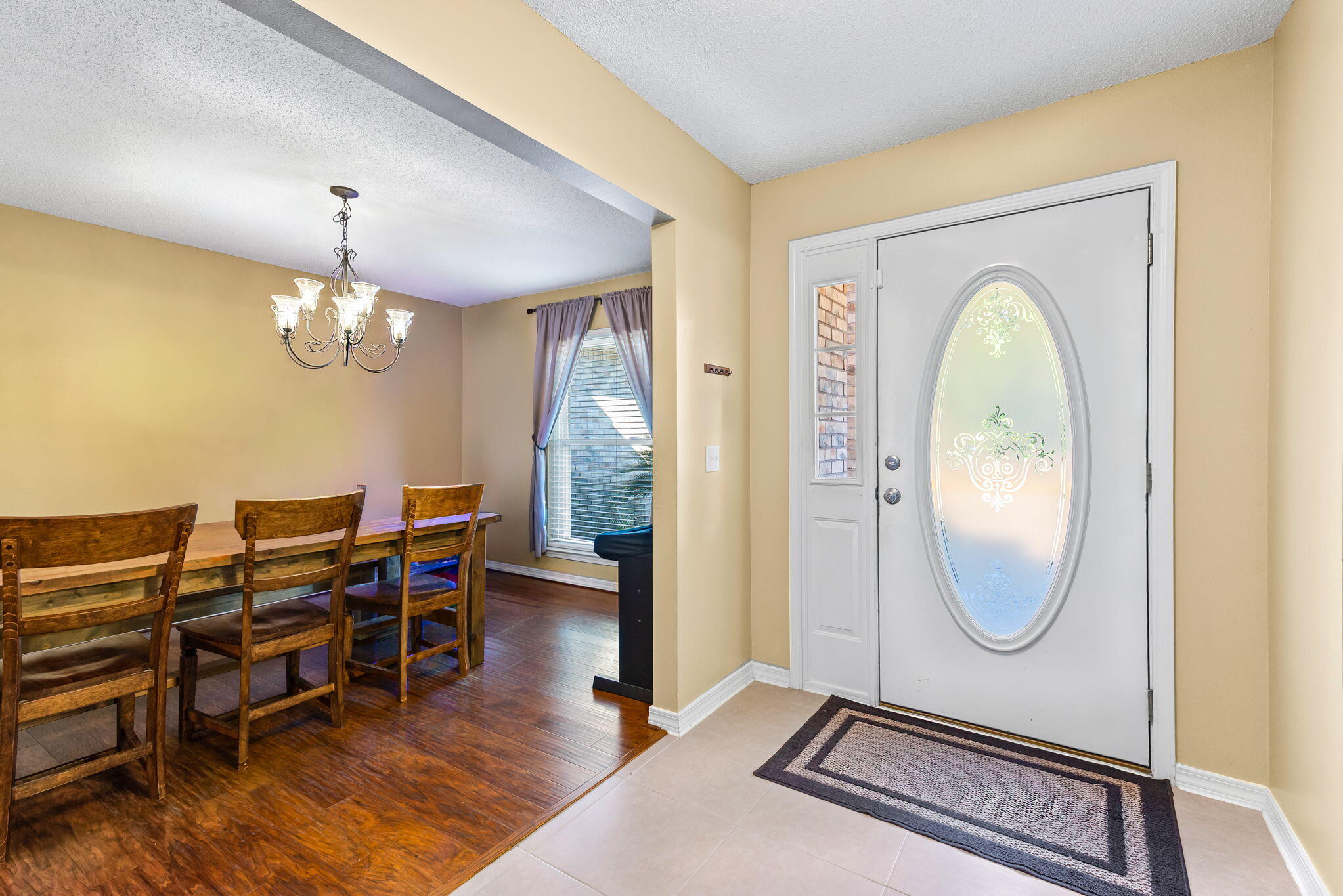 7373 Rexford Street Navarre, FL 32566 - Photo 7 of 56 a room with furniture and a window