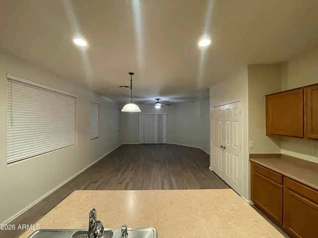 a view of a kitchen with a sink and dishwasher