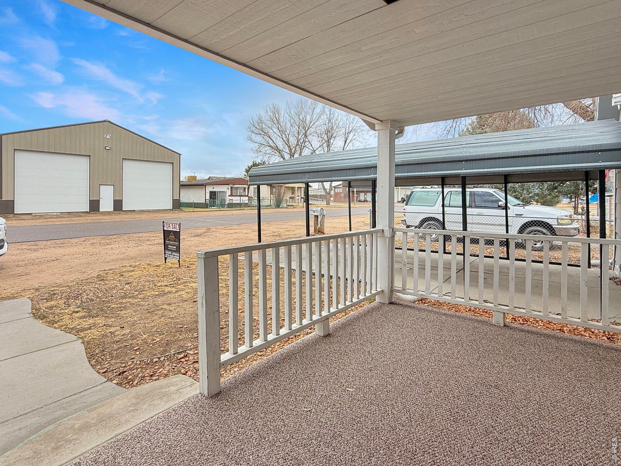 720 Phelps Street Sterling, CO 80751 - Photo 25 of 27 a view of a porch