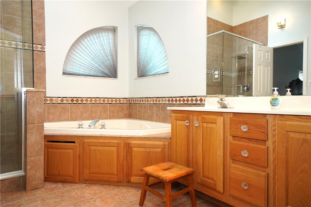 728 Mercer Street Pittsburgh, PA 15219 - Photo 13 of 27 a bathroom with a sink and a mirror
