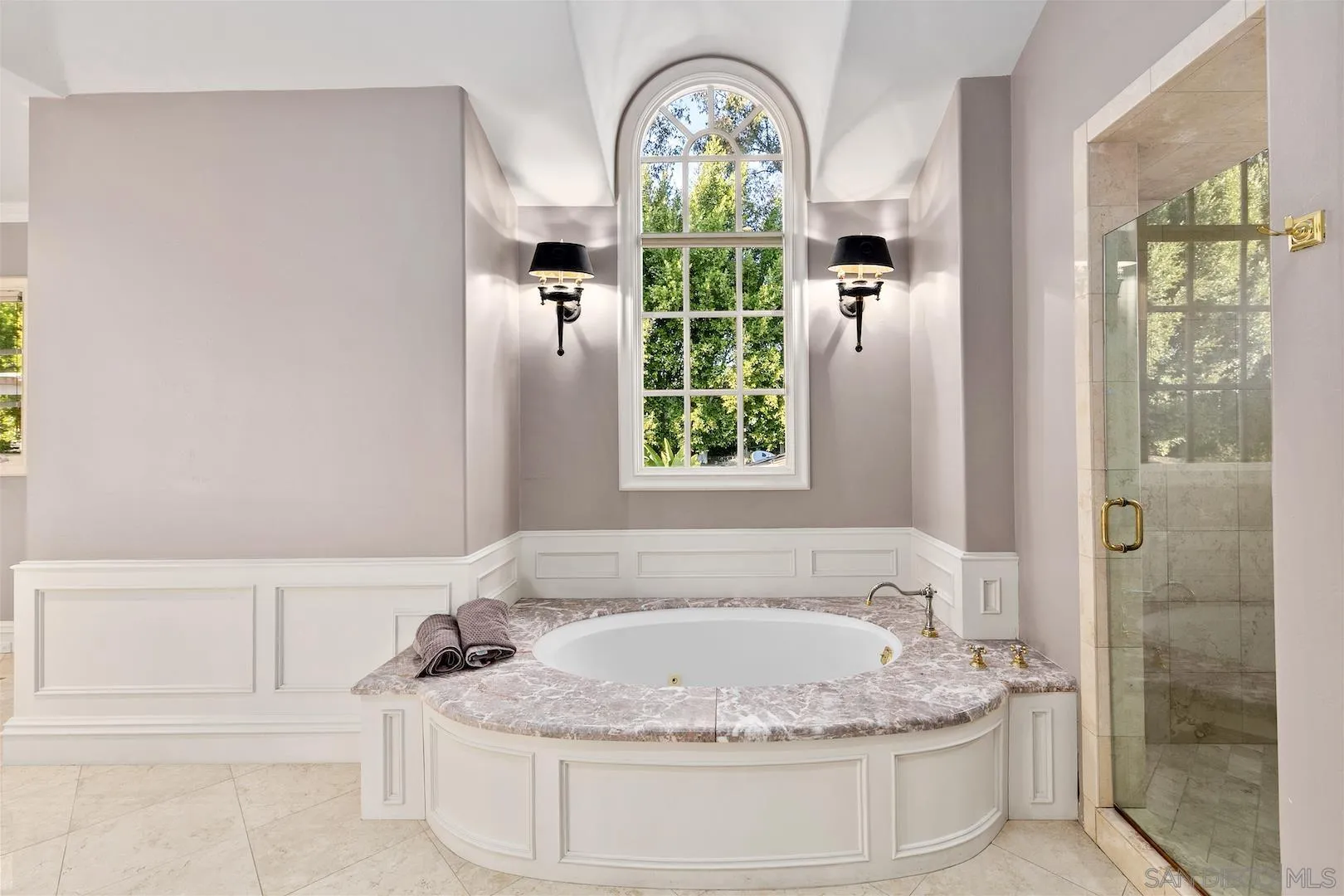 7583 St Andrews Road Rancho Santa Fe, CA 92067 - Photo 19 of 30 a bathroom with a granite countertop bathtub and window