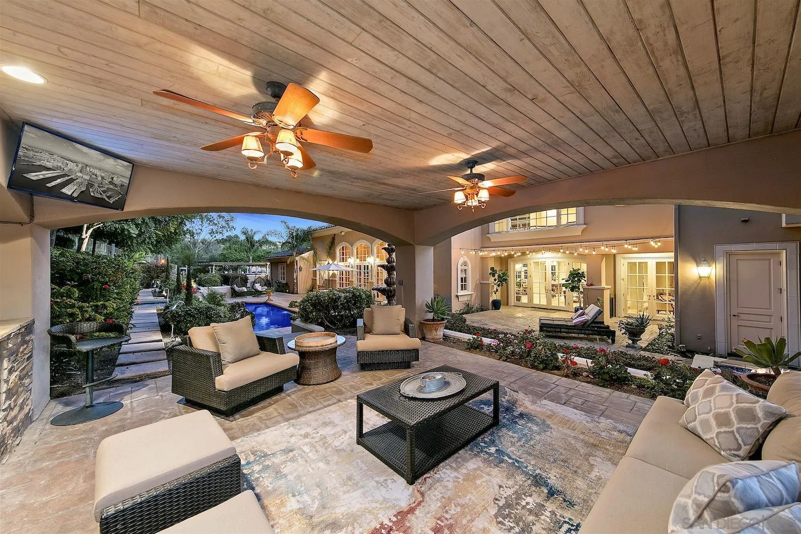 7583 St Andrews Road Rancho Santa Fe, CA 92067 - Photo 22 of 30 a living room with furniture and a large window
