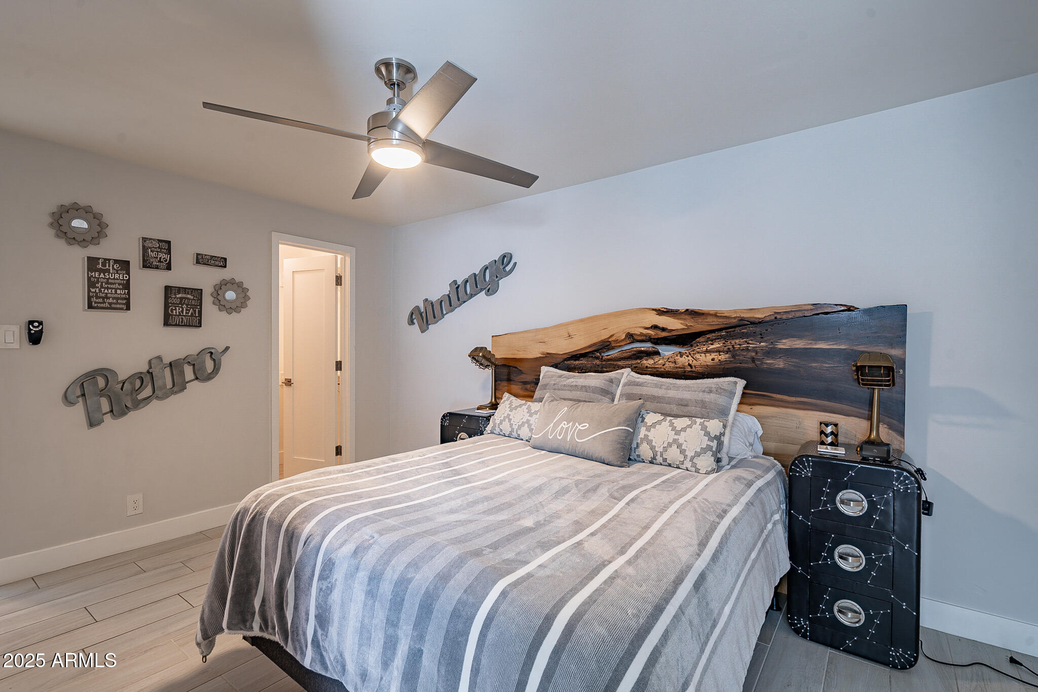 4351 North 36th Street, Unit 3 Phoenix, AZ 85018 - Photo 12 of 19 a bedroom with a bed and a tv