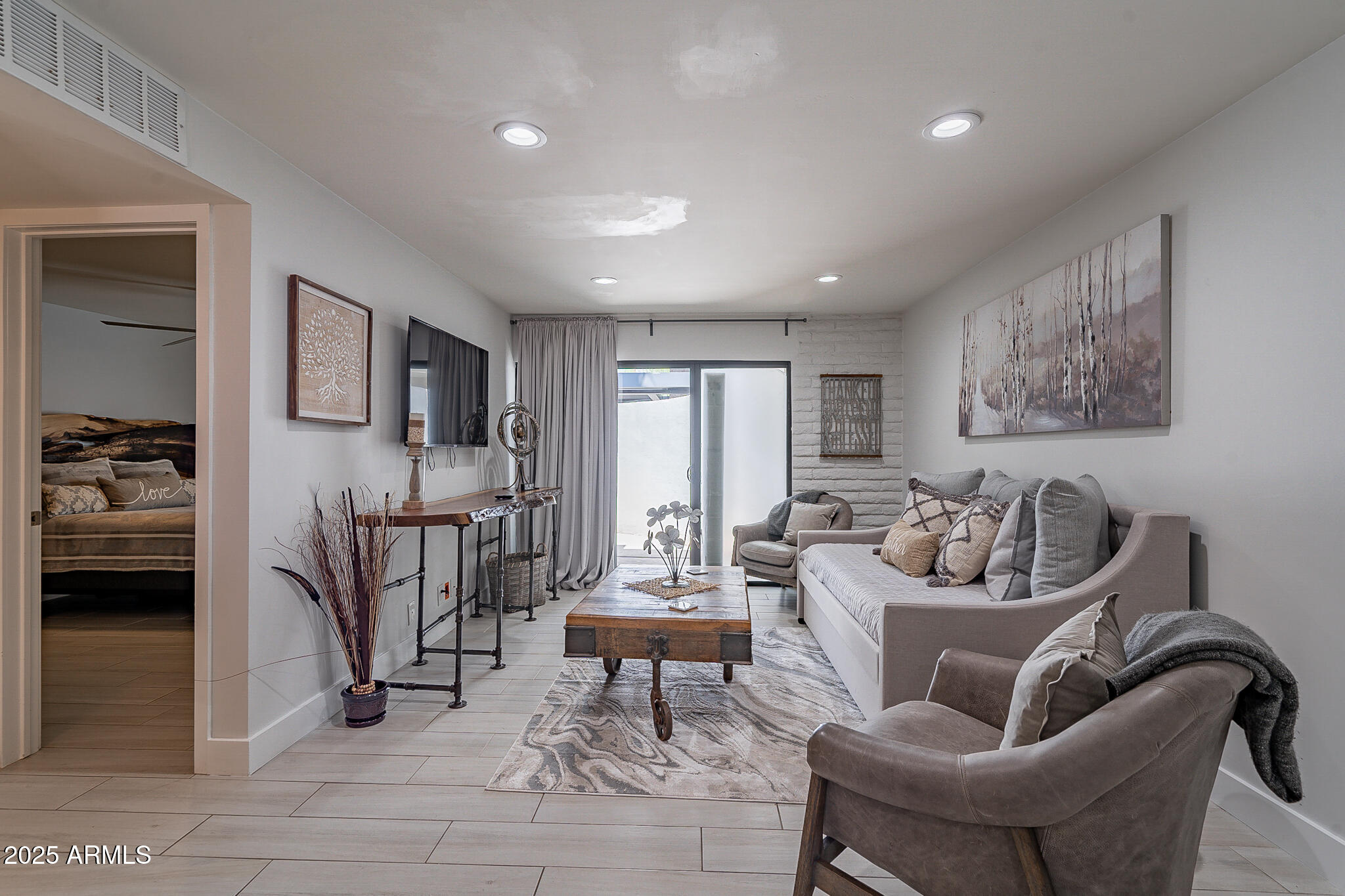 4351 North 36th Street, Unit 3 Phoenix, AZ 85018 - Photo 8 of 19 a living room with furniture and a large window