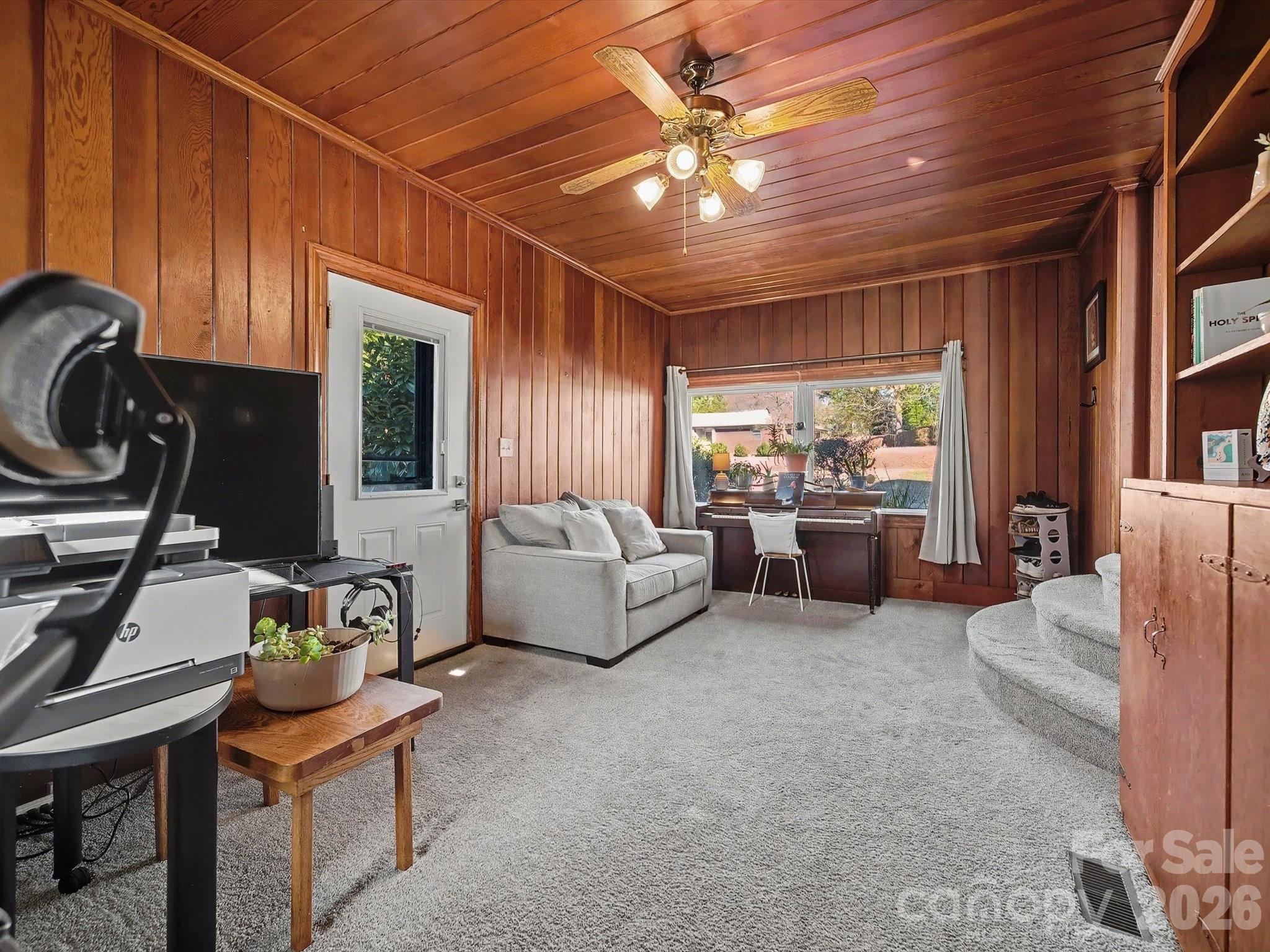309 William Street Kannapolis, NC 28081 - Photo 15 of 38 a living room with furniture and a flat screen tv