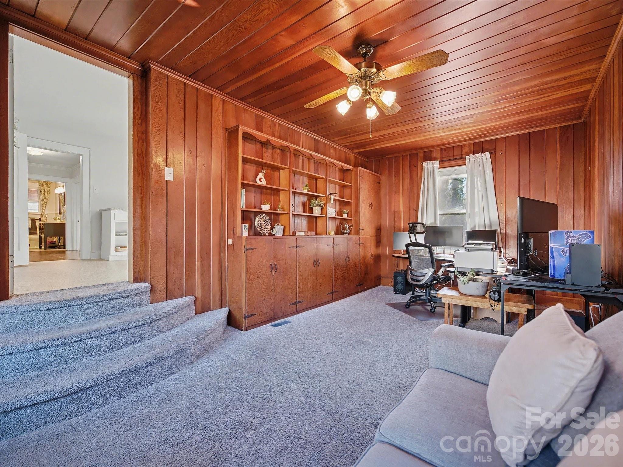 309 William Street Kannapolis, NC 28081 - Photo 16 of 38 a view of a livingroom with furniture and a window