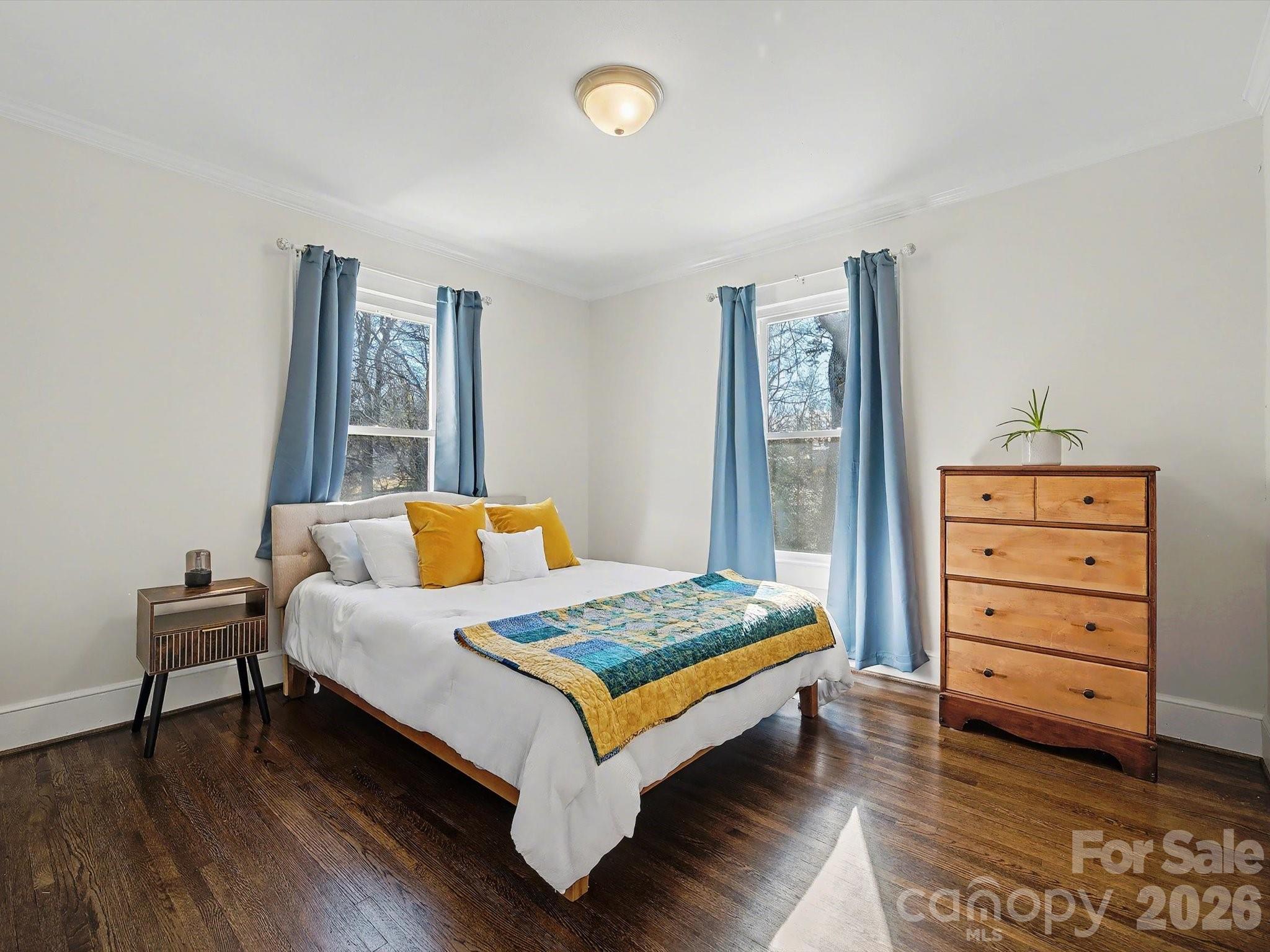 309 William Street Kannapolis, NC 28081 - Photo 18 of 38 a bedroom with a bed and a table in it