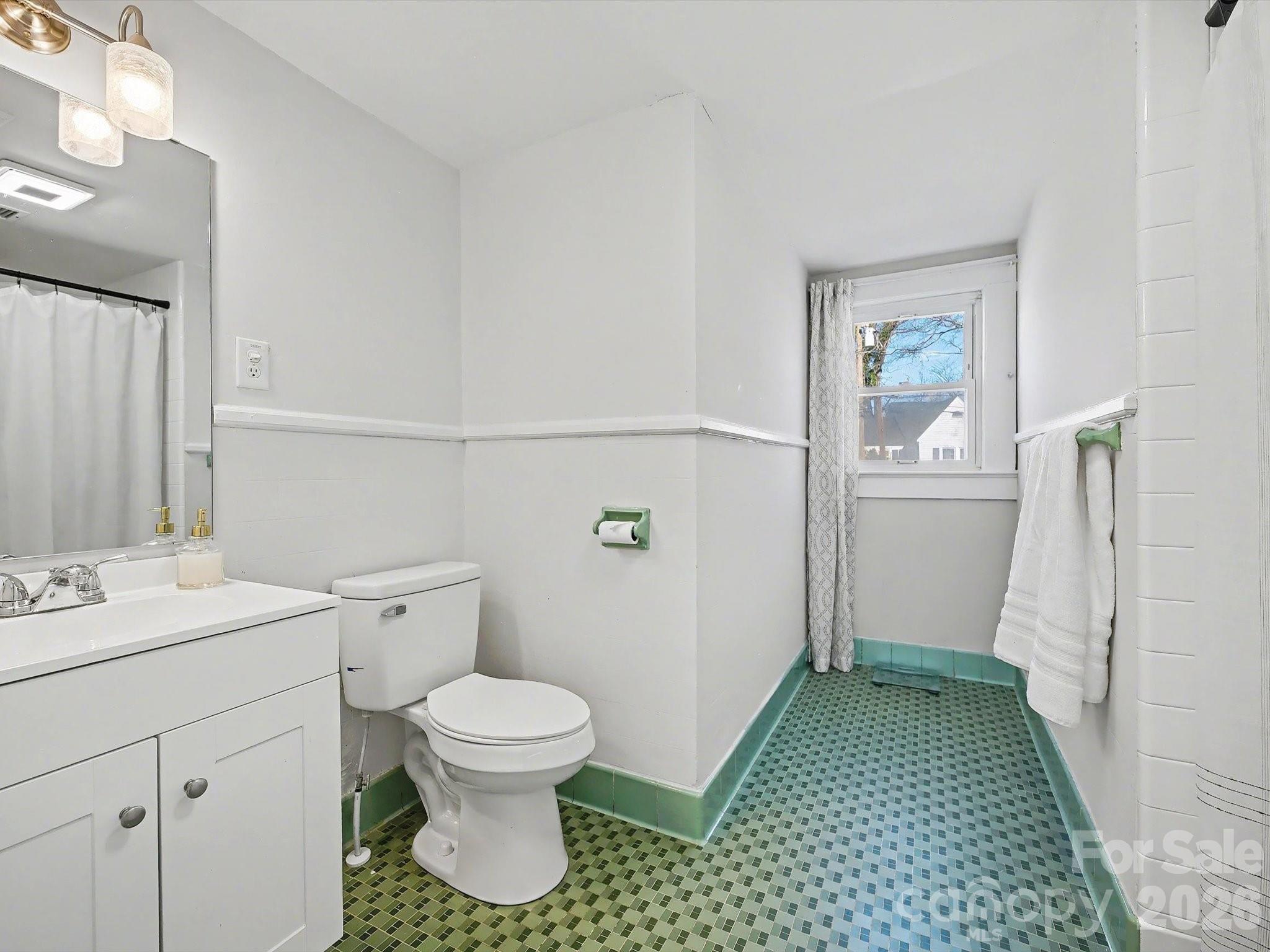 309 William Street Kannapolis, NC 28081 - Photo 25 of 38 a bathroom with a sink toilet and shower
