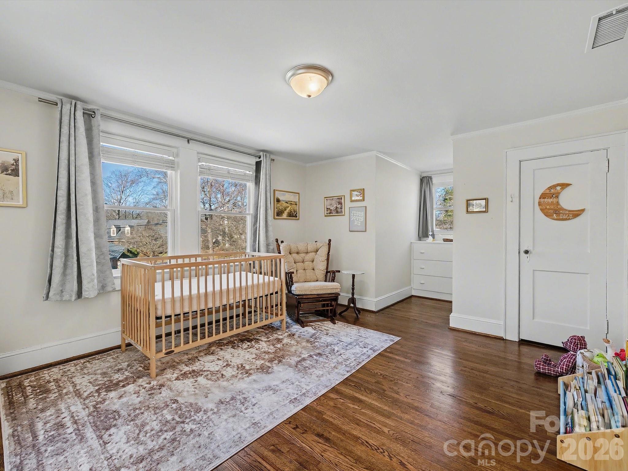 309 William Street Kannapolis, NC 28081 - Photo 27 of 38 a bedroom with furniture and wooden floor