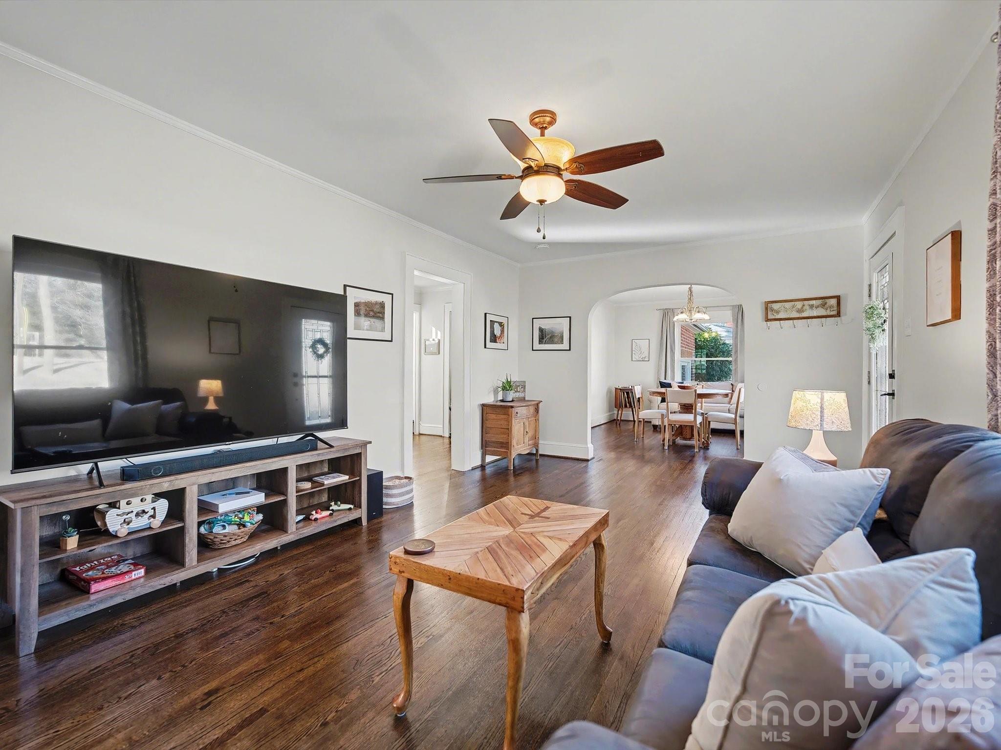 309 William Street Kannapolis, NC 28081 - Photo 5 of 38 a living room with furniture and a flat screen tv