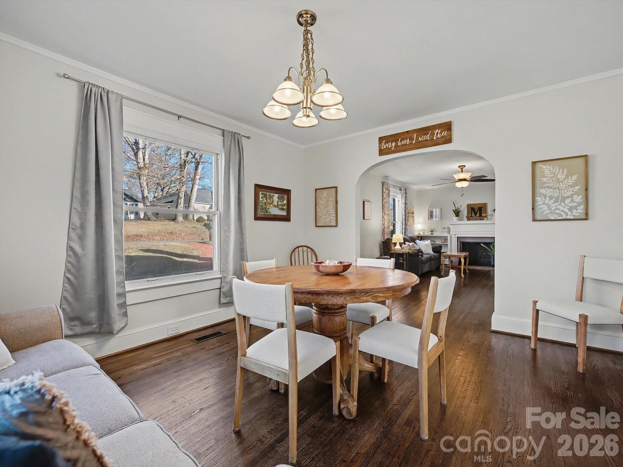 309 William Street Kannapolis, NC 28081 - Photo 7 of 38 a view of a dining room with furniture window and wooden floor
