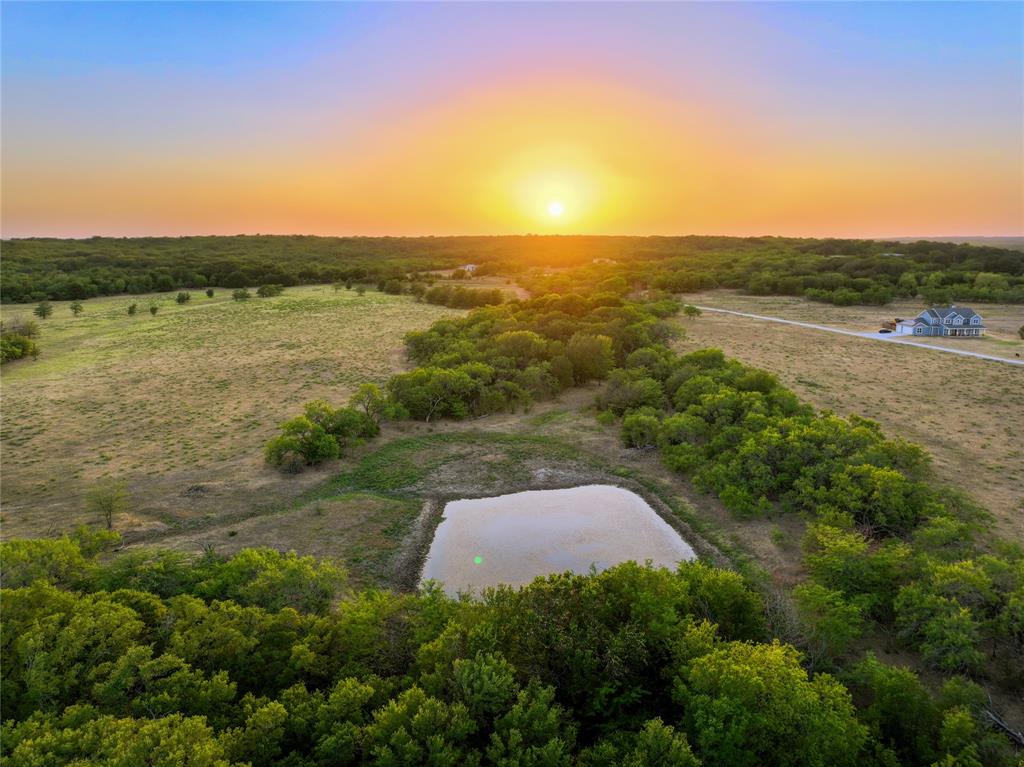 1965 Fm-933 Aquilla, TX 76622 - Photo 16 of 23 a view of a lake with a yard