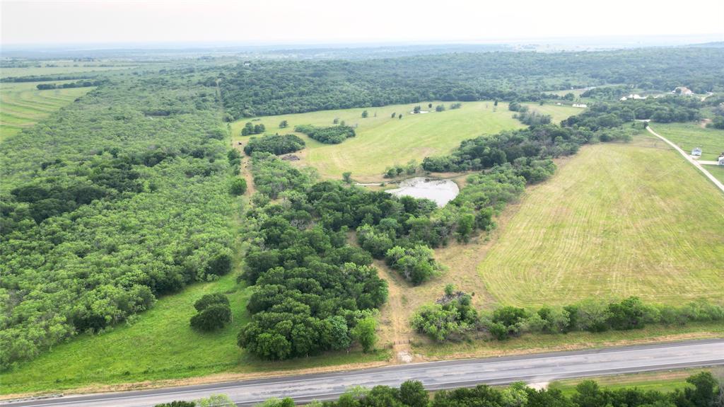 1965 Fm-933 Aquilla, TX 76622 - Photo 19 of 23 a view of a lake with a mountain in the background