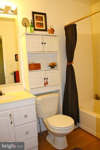 1950 Lowery Road Huntingtown, MD 20639 - Photo 27 of 28 a bathroom with a sink and a toilet